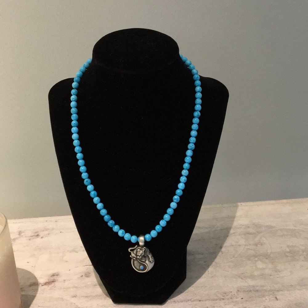 Handcrafted beaded necklace with drop